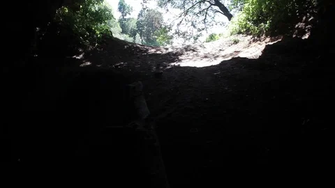 Low angle shot of beautiful young woman in trendy fashionable dress wandering in Stock Footage 99310587