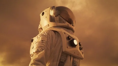 Low Angle Shot of the Brave Astronaut in the Space Suit Looking Around Planet. Stock Footage 86807681