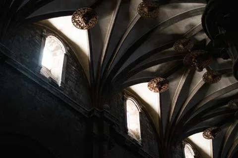 Low angle shot of a ceiling with interesting patterns and arch windows Fotos de archivo