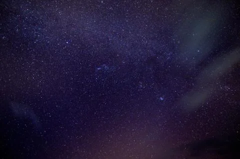 Low angle shot of a dark blue sky filled with stars - great for background Stock Photos