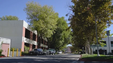 Low Angle Shot of Down the Street of Businesses Stock Footage 102238136