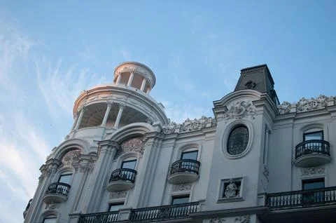 Low-angle shot of Edificio Grassy building on Gran via street. Madrid, Spain. Stock Photos