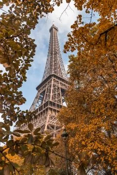 Low angle shot of the Eiffel Tower in Paris France on an autumn day Photos