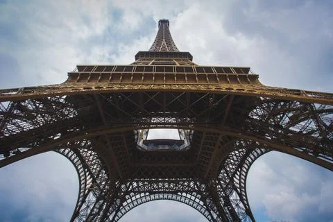 Low angle shot of Eiffel Tower Paris France with sky on the background Stock Photos