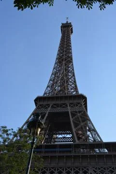 Low angle shot of the Eiffel Tower, Paris, France with blue clear sky Stock Photos