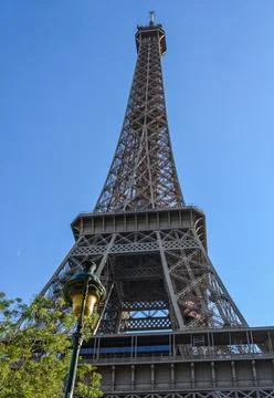 Low angle shot of the Eiffel Tower, Paris, France with blue clear sky with a 스톡 사진