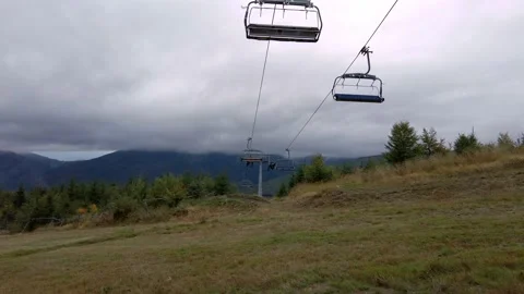 Low angle shot of empty elevator cableway for people transportation along Stock Footage 218418033