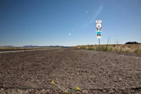 Low angle shot of an empty route with the sign WEST 66 Stock Photos
