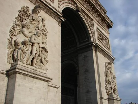 Low-angle shot of the facade of Arch of Triumph in Paris, France Stock Photos