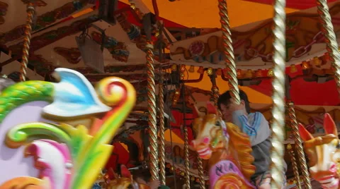 Low angle shot of fairground carousel outside Funland at Southport pier Video stock 44790407