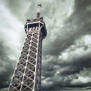 A low angle shot of the famous Eiffel Tower in Paris, France under a beautifu 写真素材