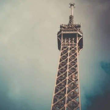 A low angle shot of the famous Eiffel Tower in Paris, France under a beautifu Stock Photos