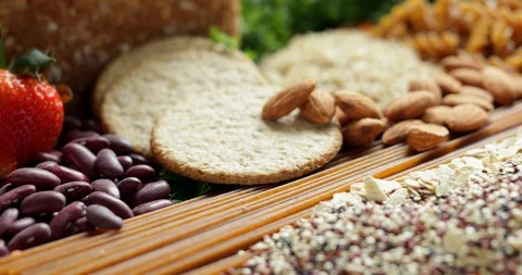 Low Angle Shot Of Foods Containing Healthy Or Good Carbohydrates Stock Footage 107934256