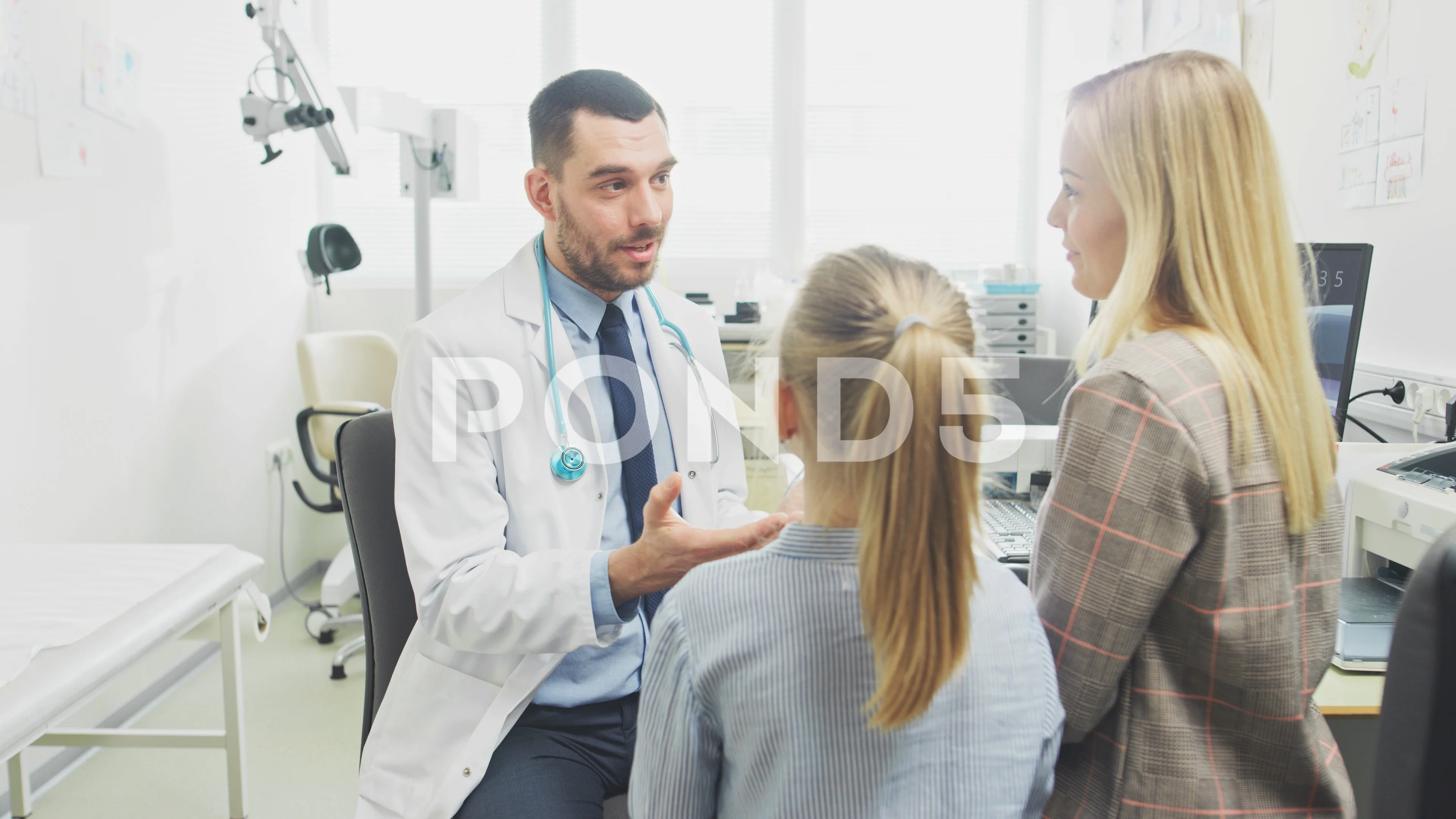 Low Angle Shot Of Friendly Doctor Explaining How Medicine Works To