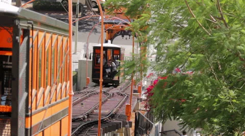 Low angle shot of funicular tram and cable car, transporting people. Video stock 24327127
