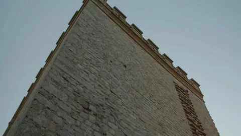 Low Angle Shot of the Gigantic Tower of the ancient Castle with Blue Sky Vídeos de archivo 166145880