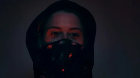 Low angle shot of hacker hacking. Dim lighting, with small red light Vidéo 92874148