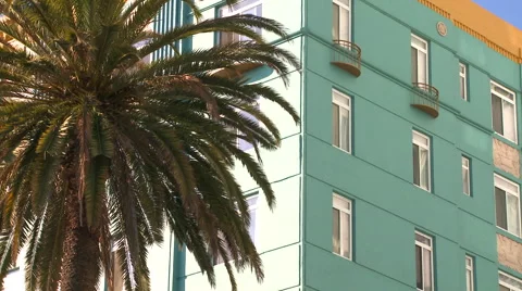 Low angle shot of a high rise apartment building in California or Miami Beach. Stockbeeldmateriaal 46609096