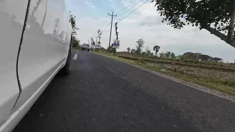 A low angle shot of a highway in Blora District, Central Java, Indonesia Stock Footage 334259630
