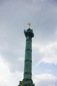 Low angle shot of July Column in Paris, France in a foggy weather Stock Photos