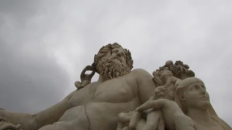 Low-angle shot of the Le Nil statue by Lorenzo Ottone in Paris, France Stock Photos
