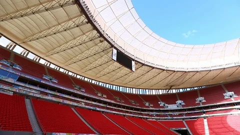 Low angle shot looking up at the open roof of the Mane Garrincha Stadium Vidéo 102463256