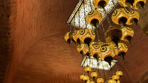 Low angle shot luminous glow of Turkish mosaic lanterns Stock Footage 340155106