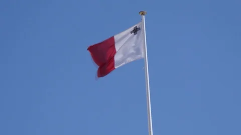 Low angle shot of Malta's waving flag Stock Footage 90311649