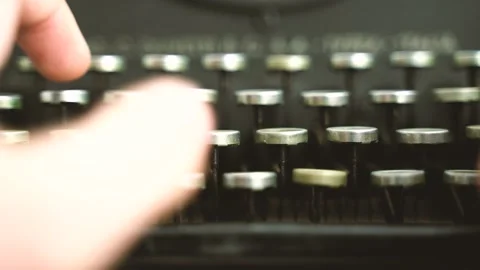 Low angle shot of a man hand typing on a vintage typewriter, high light Stock Footage 149348016
