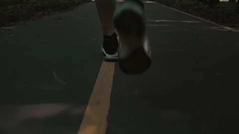 Low angle shot of man training for marathon run Stock Footage 201236315
