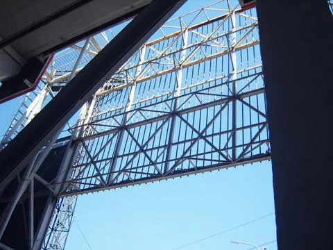 Low-angle shot of a massive metal truss framework and industrial steel supp.. Stock Photos