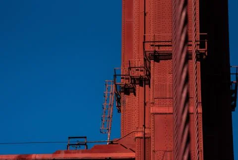Low angle shot of metal construction with the clear blue sky in the backgroun Stock Photos