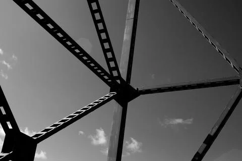 Low angle shot of metal construction pattern in grayscale Stock Photos