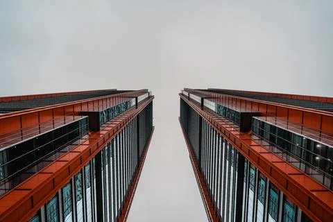 Low Angle Shot of Modern Red Towers Skyscrapers Stock Photos
