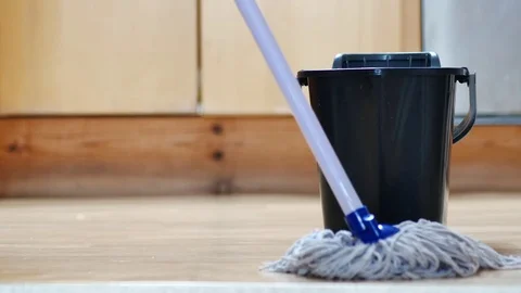 Low angle shot of mop and bucket Stock Footage 72786082