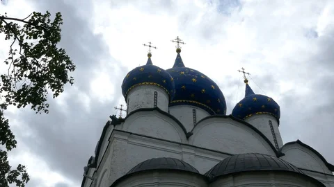 Low angle shot of Nativity Cathedral in Suzdal Kremlin Russia with clouds in sky Stock Footage 98381046