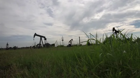 Low Angle Shot of Oil Pumps Stock Footage 65826455
