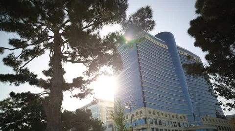 Low angle shot of Park Bulvar and Hilton hotel in Baku Stock Footage 60650609