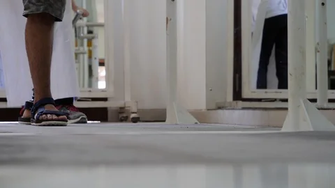 Low angle shot of a patient trying on new prosthetic leg in an office, Bali Stock Footage 140267068