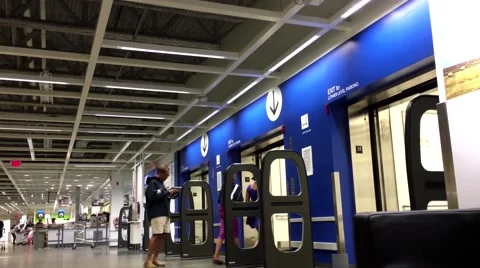 Low angle shot of people taking elevator inside Ikea store Video stock 64515074