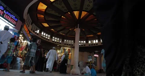 Low Angle Shot of People Walking inside Souk Mutrah (4K) Stock Footage 45872104