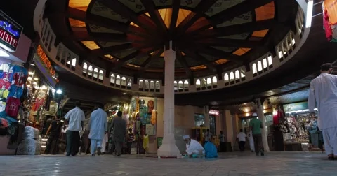 Low Angle Shot of People Walking Inside Souk Mutrah (4K) Stock Footage 45872109