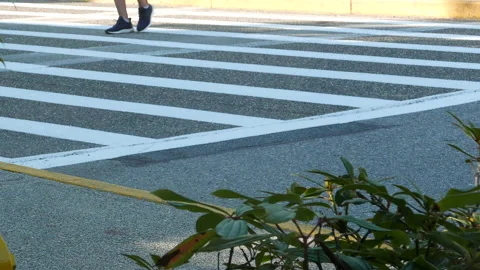 Low angle shot of people walking through crossroads with 4k resolution 스톡 동영상 94743473