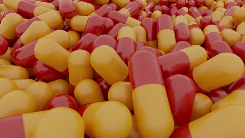 Low Angle Shot of Pills or Capsules Used for Medication Stock Footage 150216188