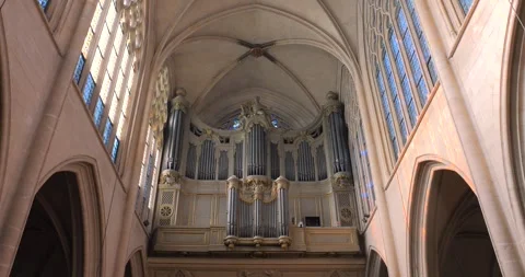 Low angle shot of pipe organ in the interior of a roman catholic church of Stock Footage 255874044