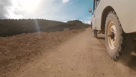 Low angle shot of a off-road pickup truck car driving on desert off-road Video stock 172040789