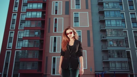 Low angle shot of seductive young businesswoman confidently walking, playfully Stock Footage 112674444