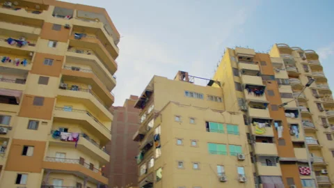 Low angle shot of some tall apartment buildings in a residential area of Cairo Stock Footage 306027164