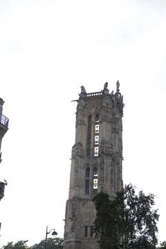 Low angle shot of the Square of Saint-Jacques building under a cloudy sky Stock Photos