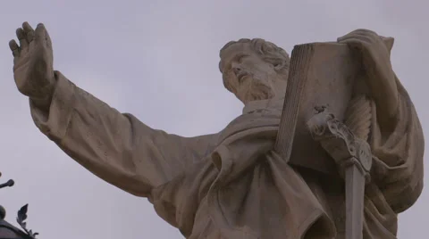 A low angle shot of a Statue of Saint Paul with his arm raised Stock Footage 65405649